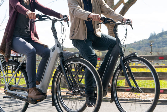 Gazelle Arroyo C8 HMB Elite Commuter electric bike couple riding on Fly Rides