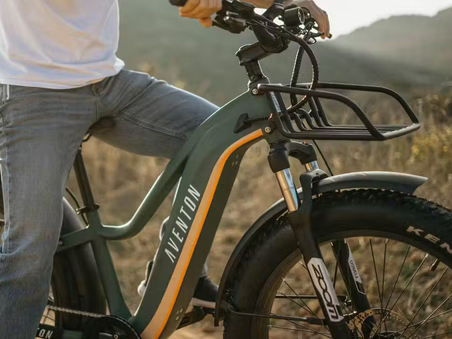 Aventon Aventure Front Rack Shown Installed on a green Aventure