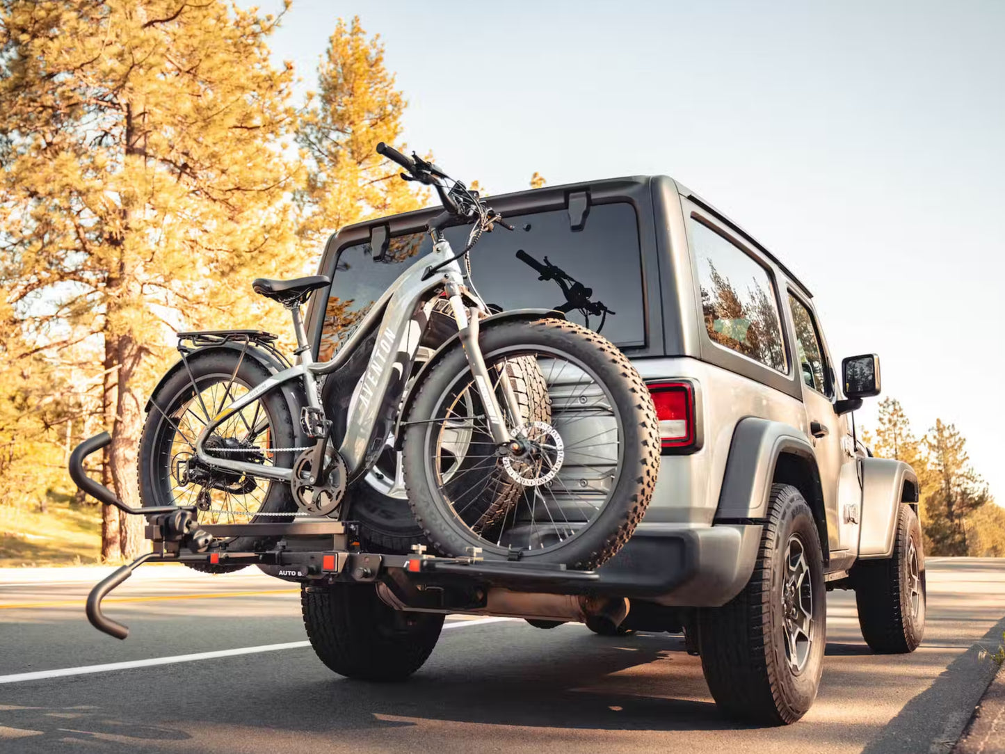 Aventon Hitch Rack Shown on a Jeep with an Aventure on it