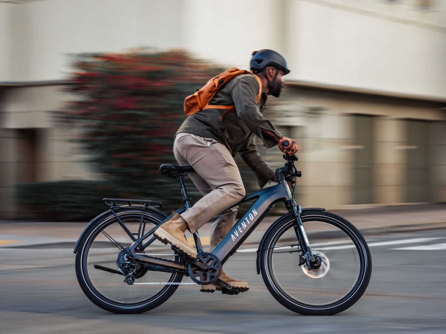 Aventon Level 3 Step-Through Road / commuter eBike Rider commutin on city street