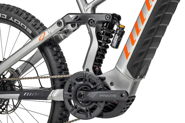 Niner WFO e9 Full suspension eMTB Forge grey / orange Motor, Rear shock, Crank, Chainring closeup