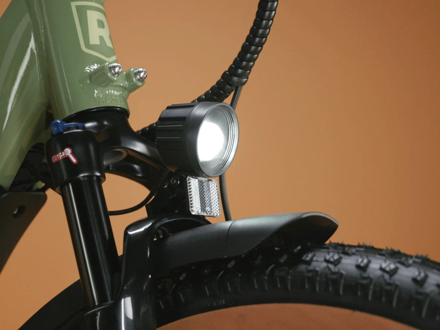 Rad Power Radster™ Trail Electric Off-Road Bike Fir green Headlight and fender closeup