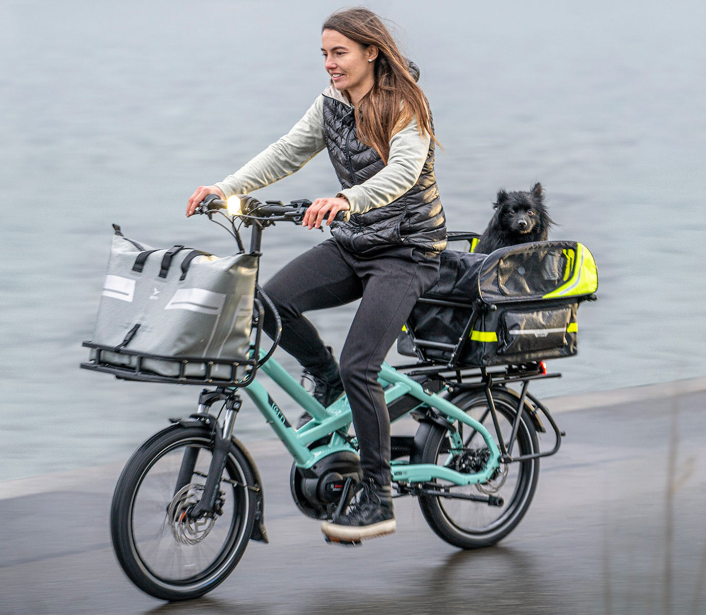 Woman and pup enjoying a ride on the Tern HSD