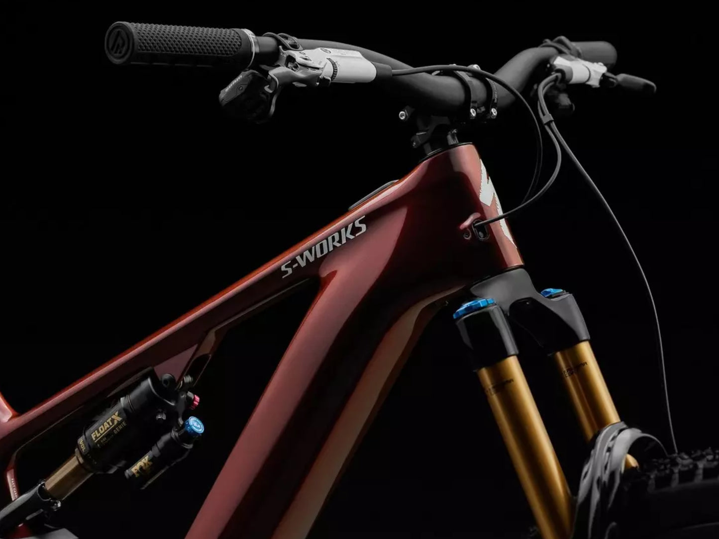 Specialized Turbo Levo S-Works Full suspension eMTB Gloss red pearl / black metallic / white silver metallic Handlebar, rear shock, fork closeup