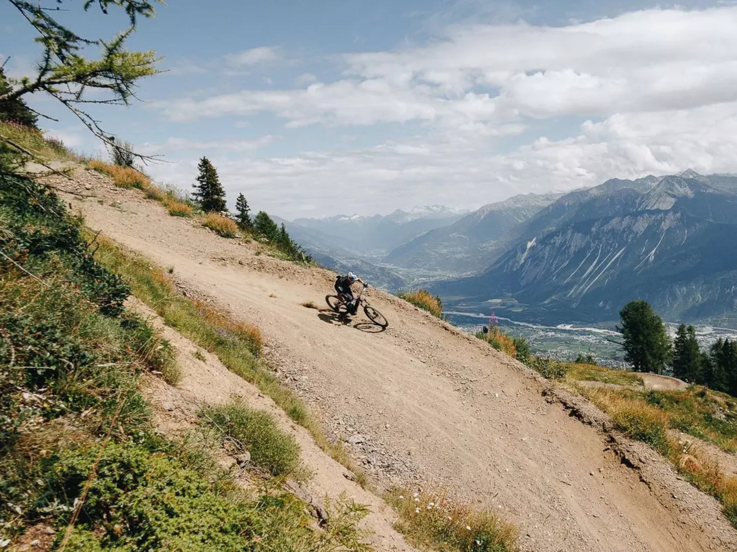 Specialized Turbo Levo S-Works Full suspension eMTB Rider on downhill trail on mountain terrain