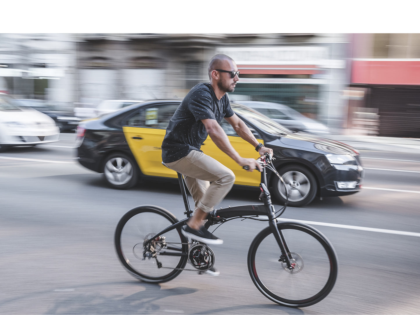 Tern Eclipse folding bike. Man commuting in the city