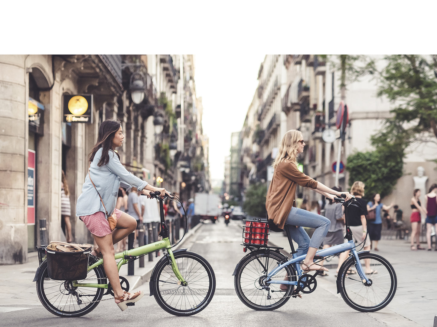 Tern Node folding bike. Women riding in the city