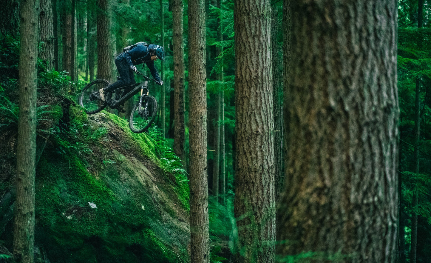 Transition Repeater EP8 Lifestyle Man riding, jumping mountain terrain