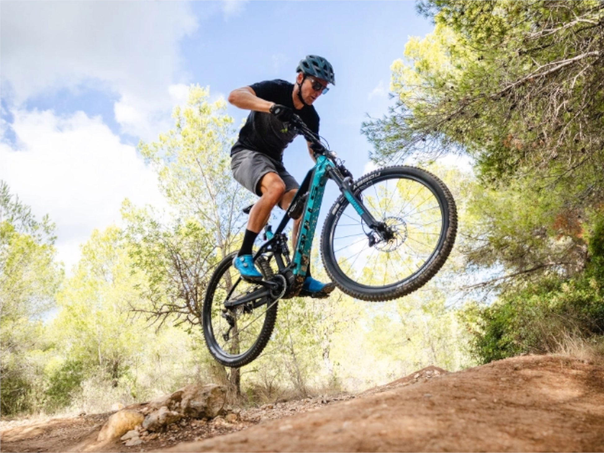Bulls Copperhead EVO AM 1 750 eMTB full suspension dark petrol riding forest single track trail.jpg