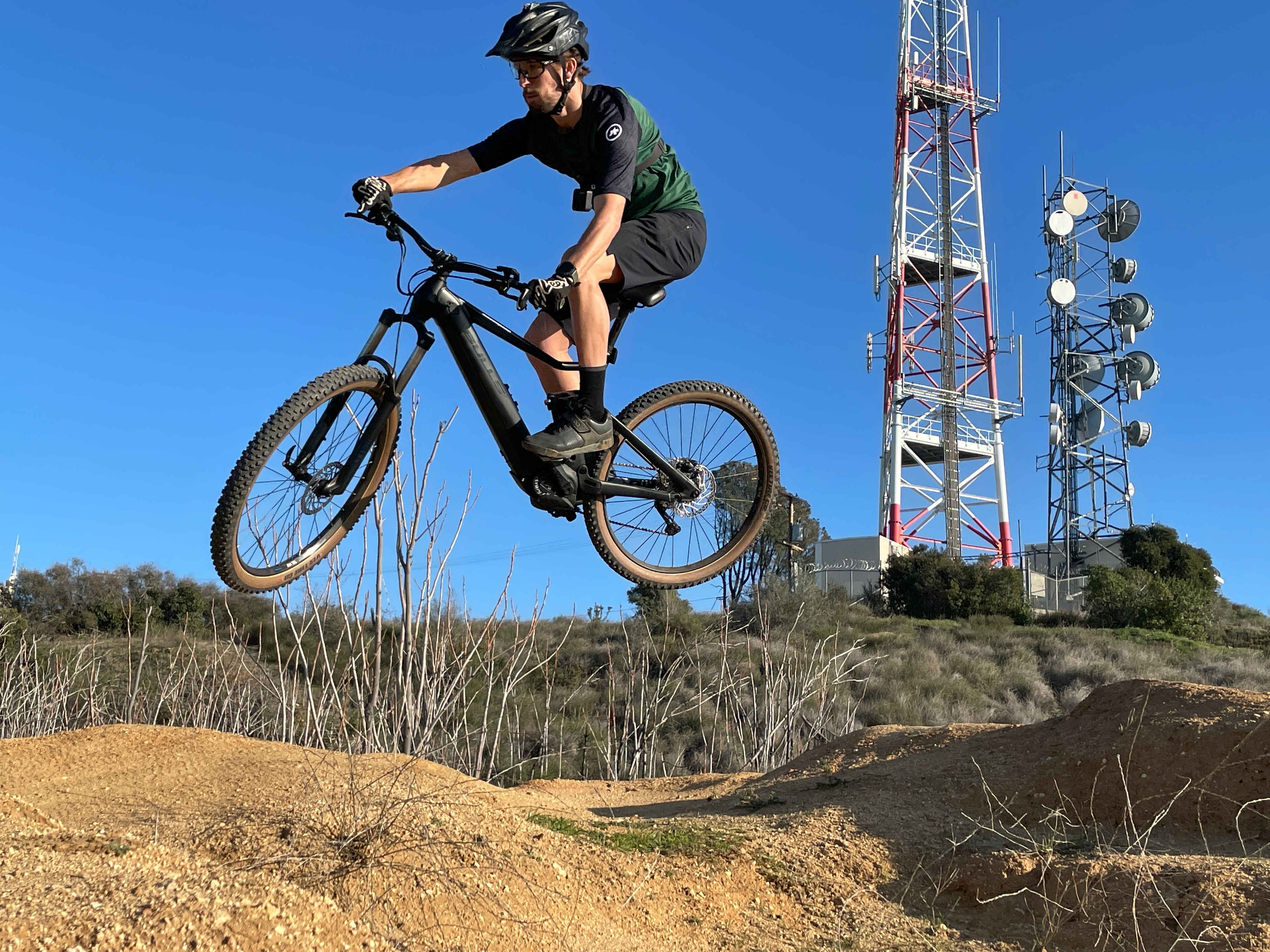 Bulls Copperhead EVO AM 1 750 eMTB full suspension dark petrol riding jumping downhill