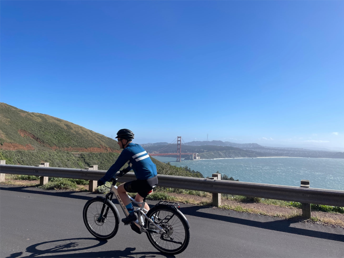 Bulls Iconic Evo eMTB hard tail touring on road ocean coastline