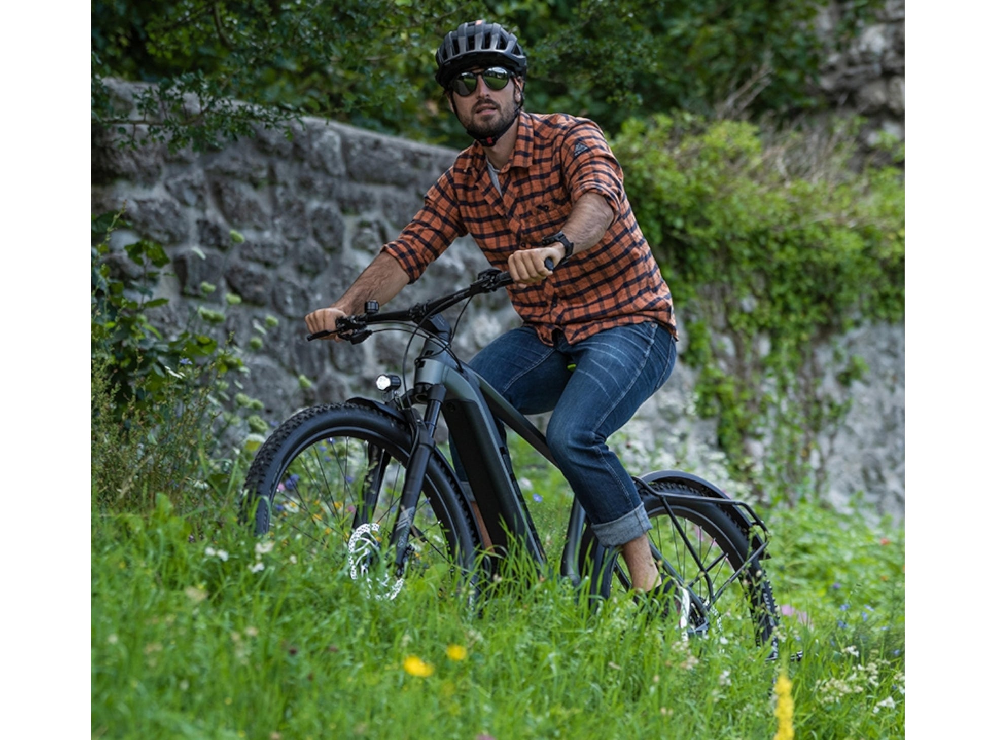Cube Reaction Hybrid Pro 500 All Road eMTB hardtail man riding on trail hill in background