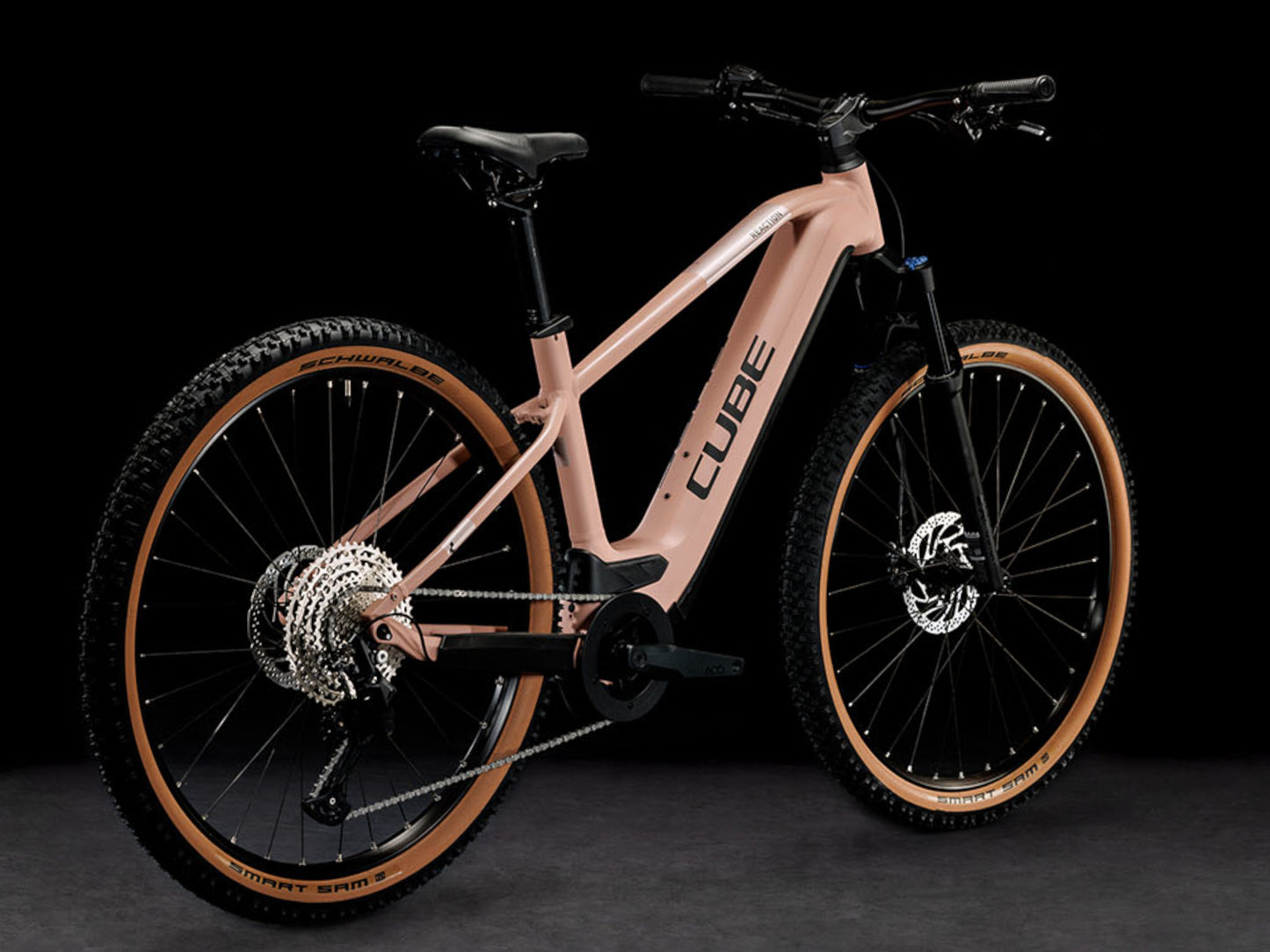 Cube Reaction Hybrid Pro 500 eMTB hardtail blushrose n silver back right side profile on Fly Rides