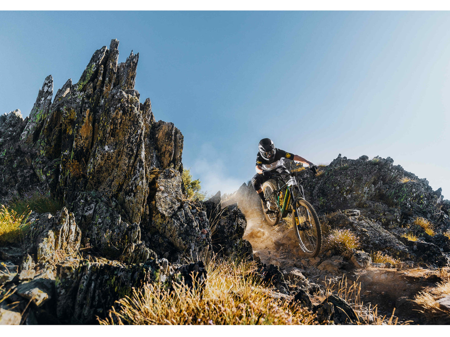 Mondraker Level XR eMTB full suspension riding down steep rocky trail