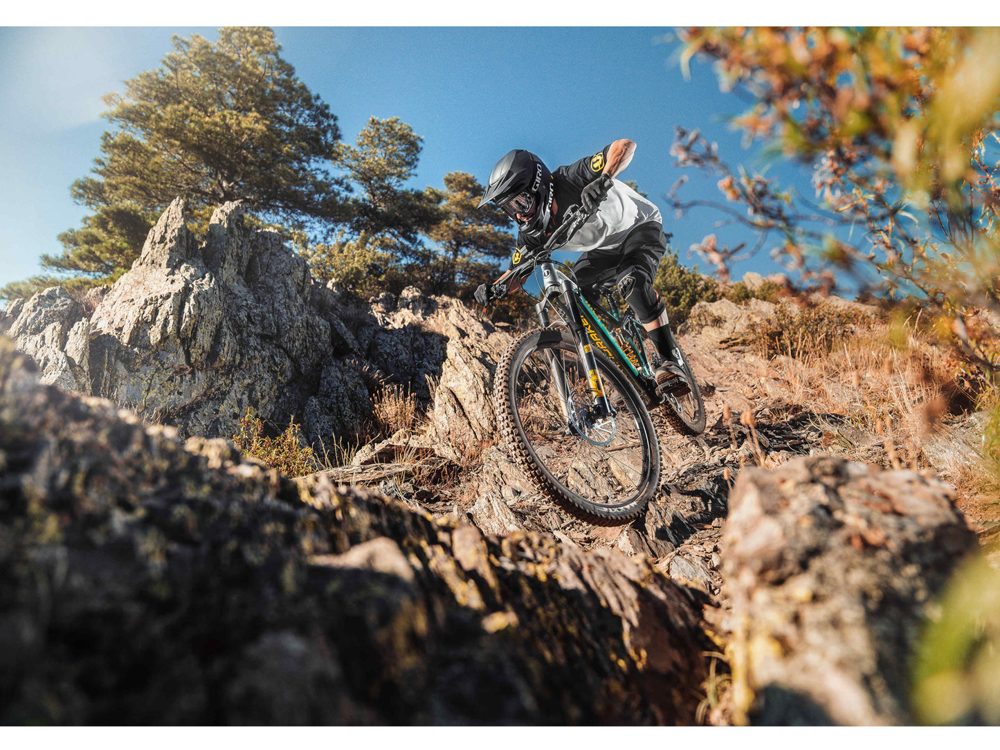 Mondraker Level XR eMTB full suspension man riding down technical single track