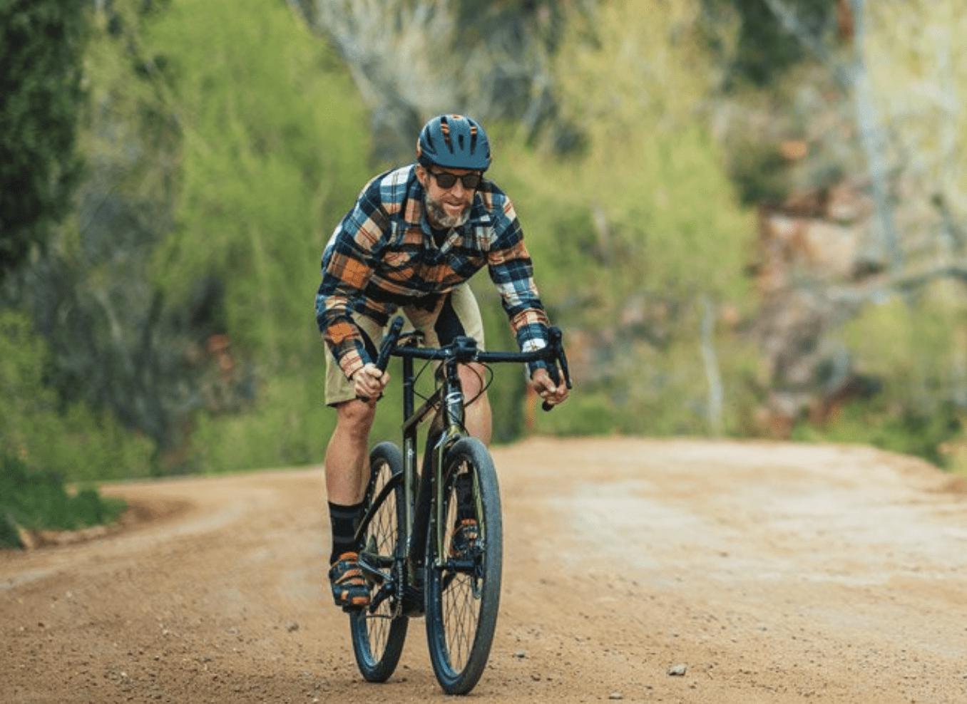 Niner RLT e9 RDO eMTB riding on a trail on Fly Rides