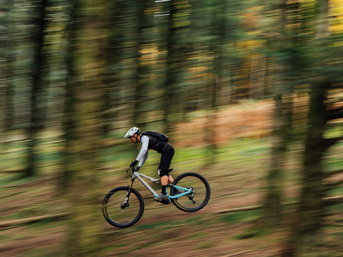 Fast action shot of an Orbea Rise SL H30 e-mountain bike