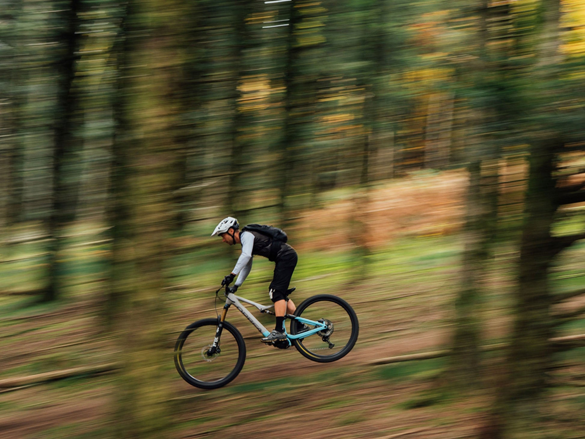 Fast action shot of an Orbea Rise SL H30 e-mountain bike