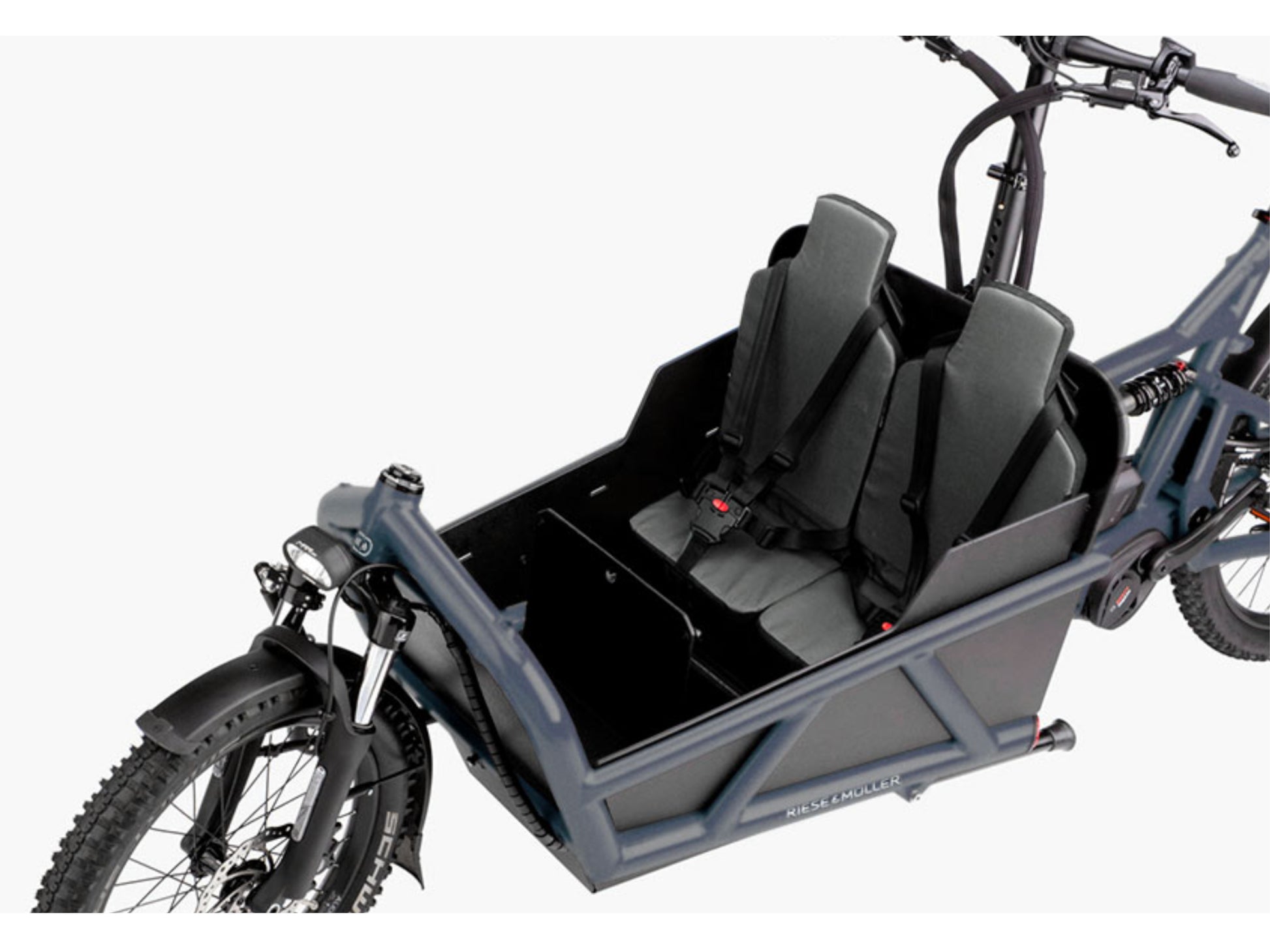 Riese and Muller Load 60 Touring HS eMTB full suspension closeup low sidewalls two childseat option