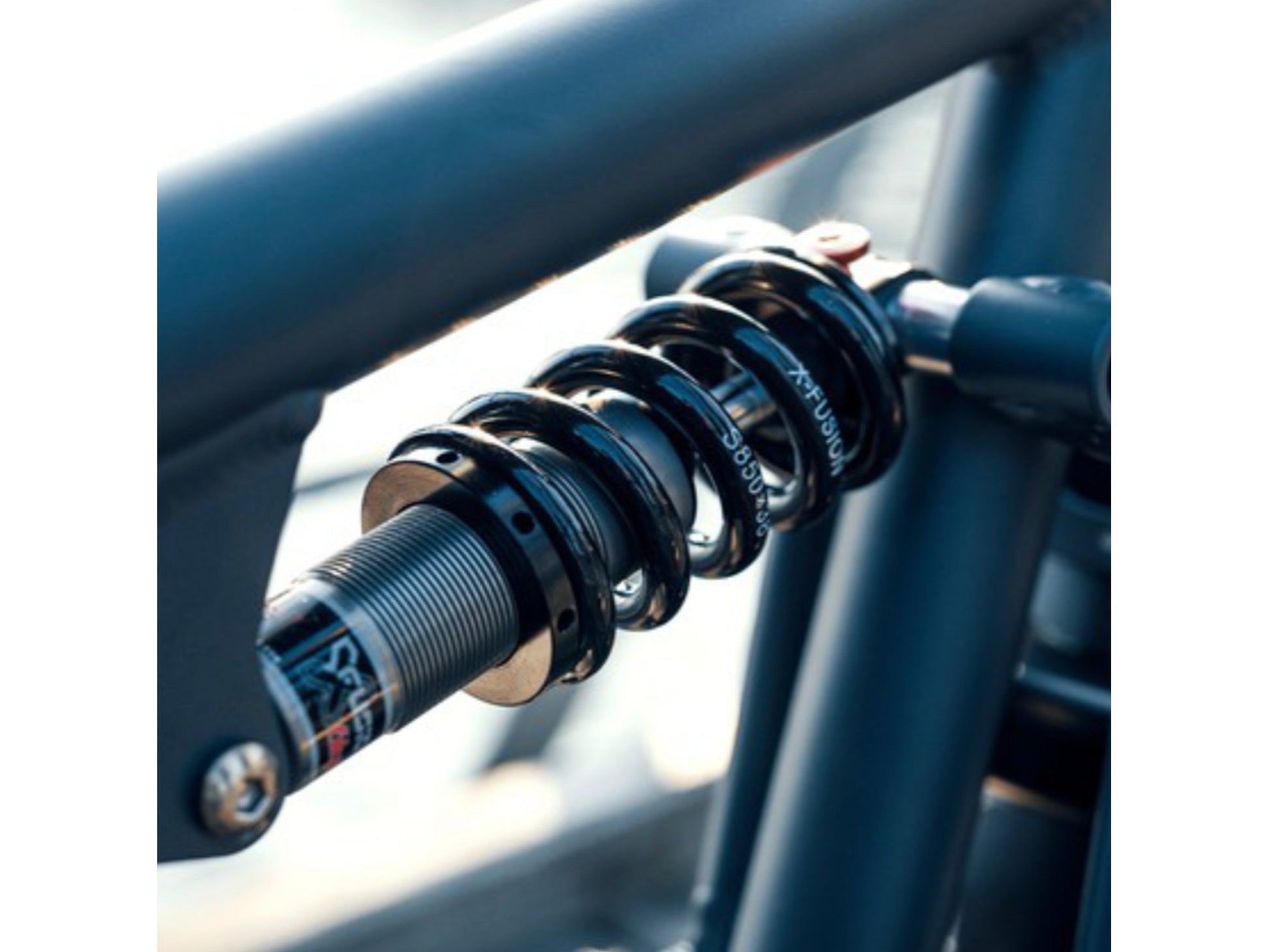 Riese and Muller Load 75 Touring eMTB full suspension close up X Fusion Glyde rear shock