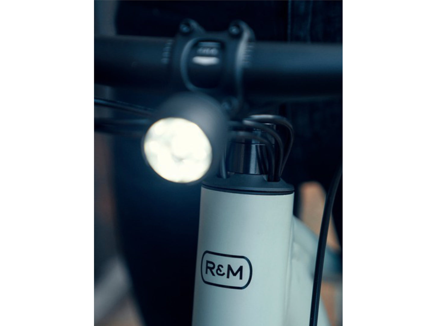 Riese and Muller Roadster Mixte Touring eMTB hardtail close up headlight headset