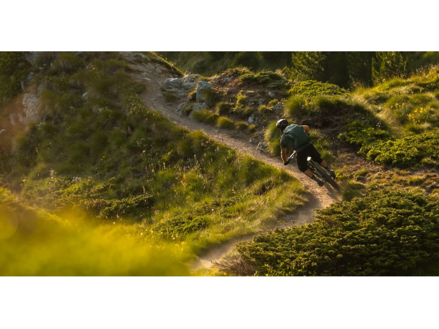 Scott Patron eRide 900 eMTB full suspension person riding downhill single track mountain trail