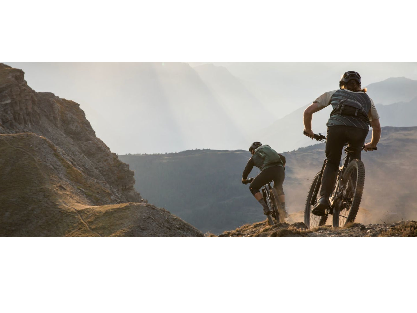 Scott Ransom eRide 920 eMtb full suspension two men riding downhill on mountain single track