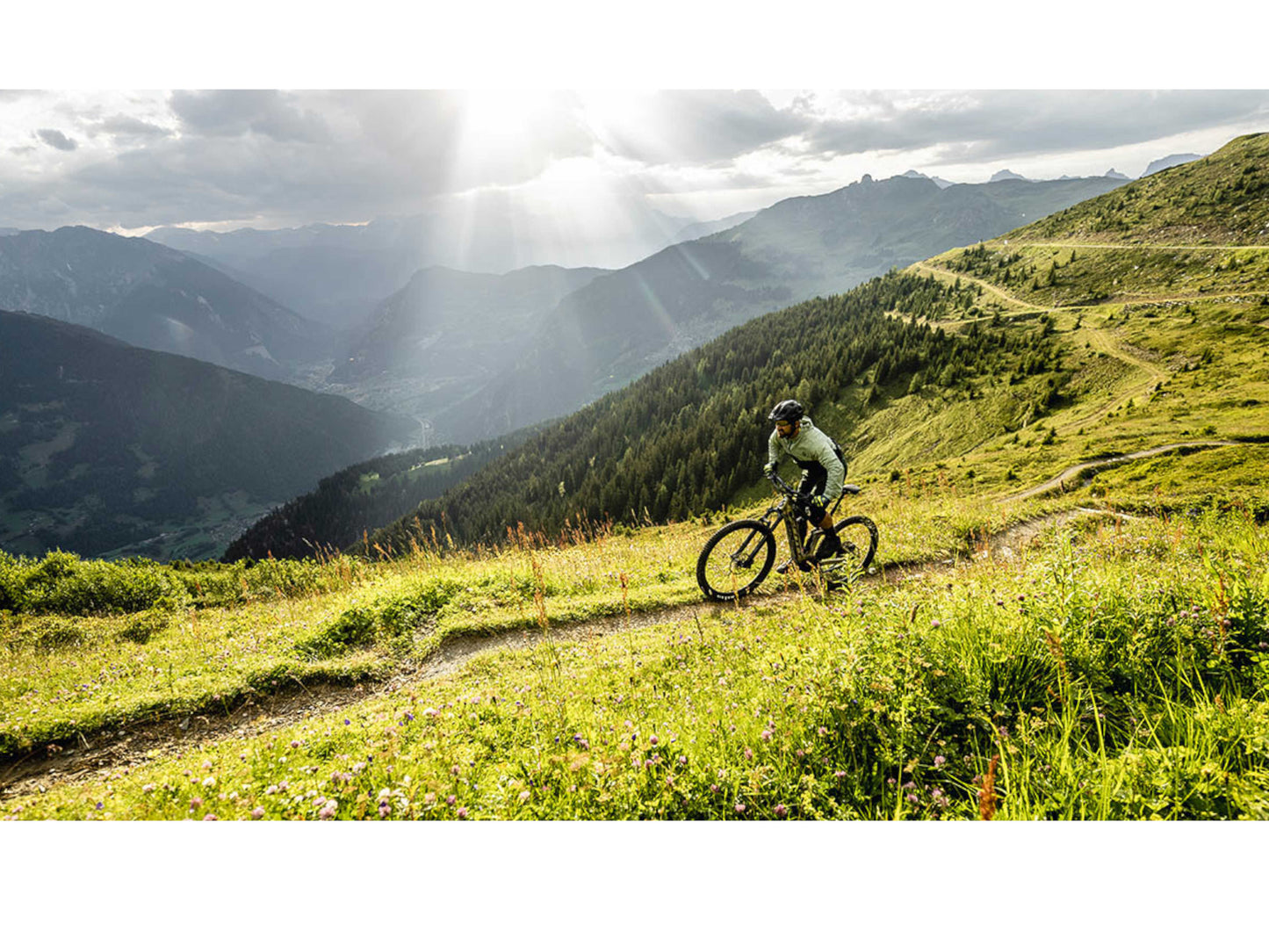 Scott Strike eRide 930 eMtb full suspension man riding on mountain single track