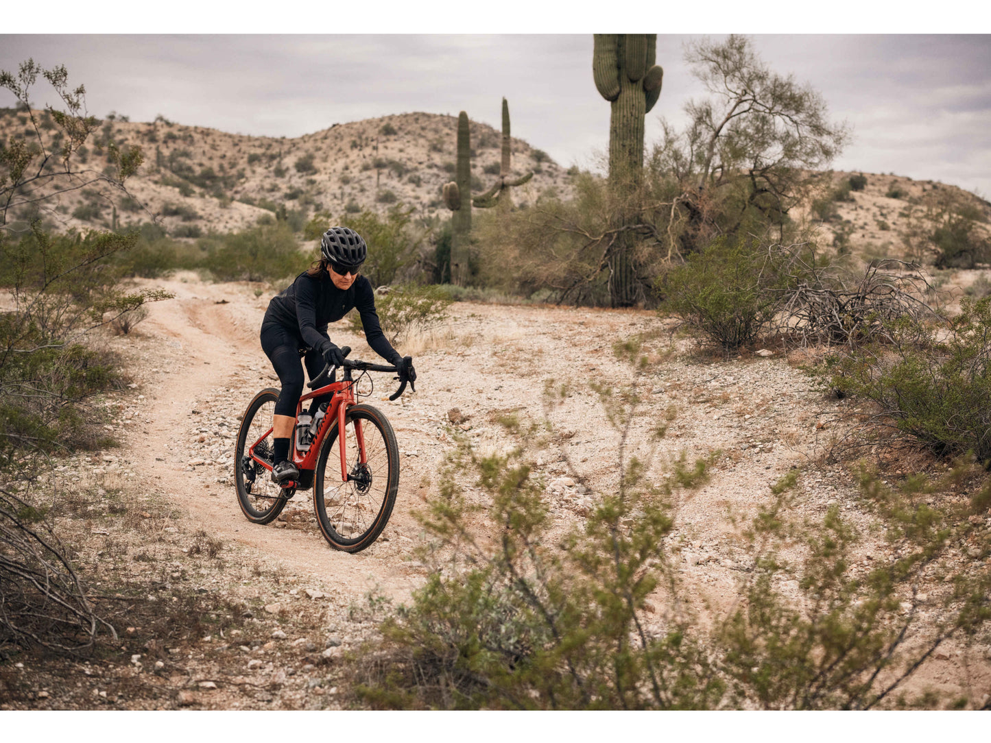 Specialized Turbo Creo SL Comp E5 eMTB Tarmac Black White Silver person riding desert trail