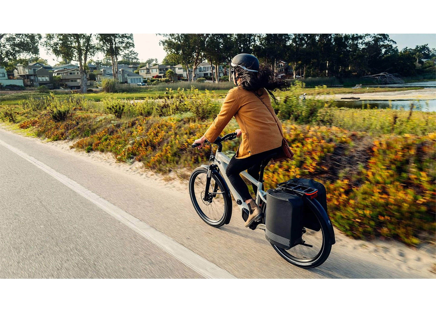 Specialized Turbo Vado 3.0 electric bike action photo touring coastline