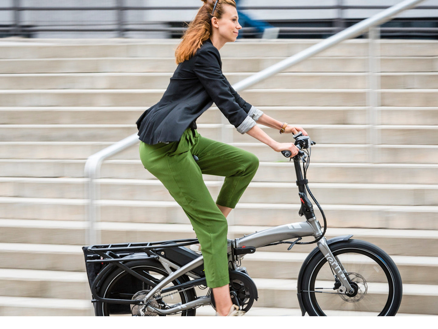 Tern Vektron Q9 electric bike satin action photo city street