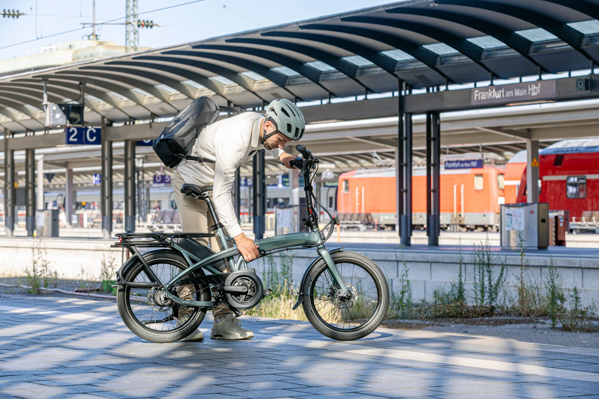 Tern Vektron Gen 4 folded on a train — multimodal commuting