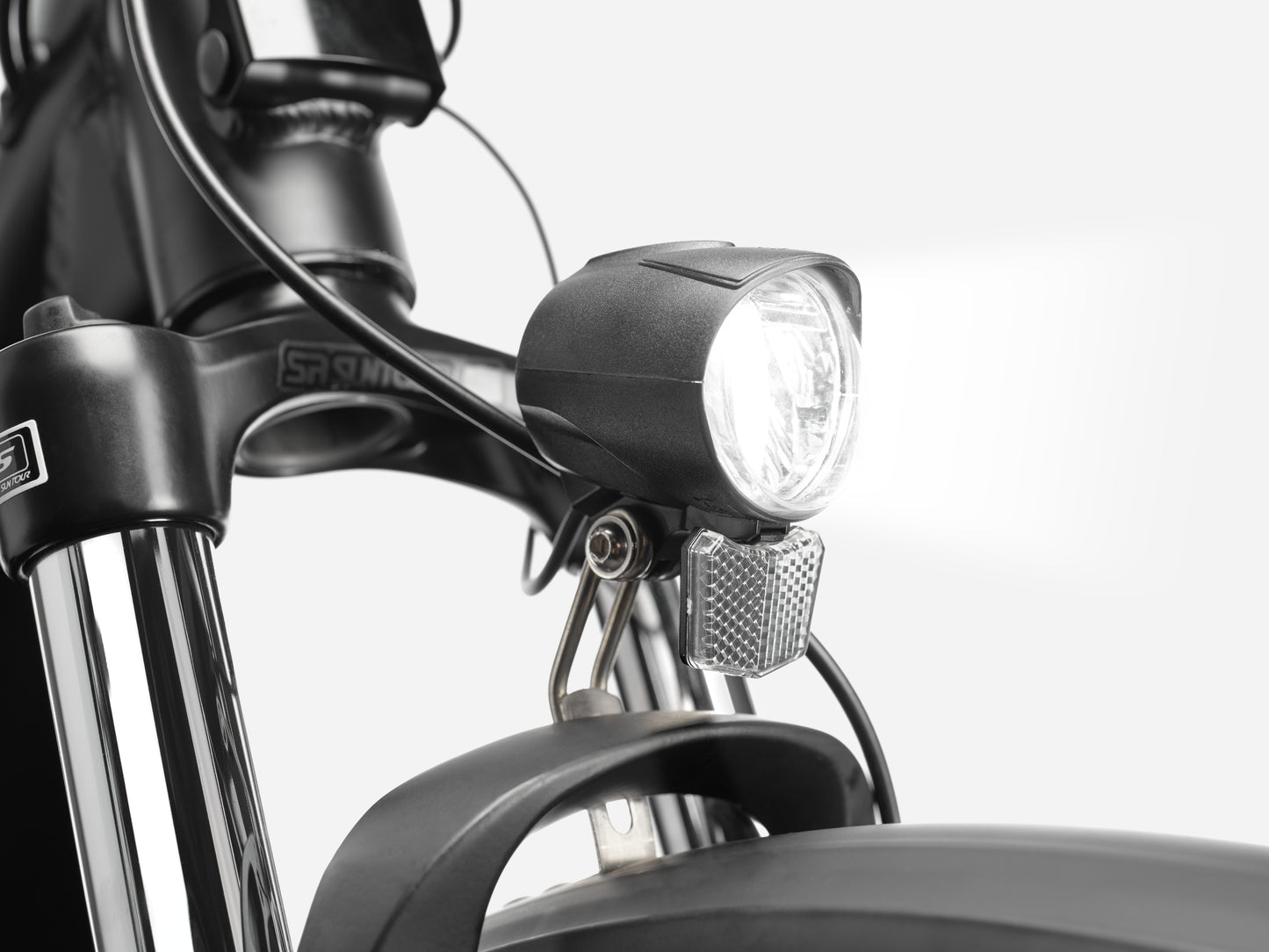 Cannondale Adventure Neo Allroad Electric bike. Road / commuter Black Headlight closeup