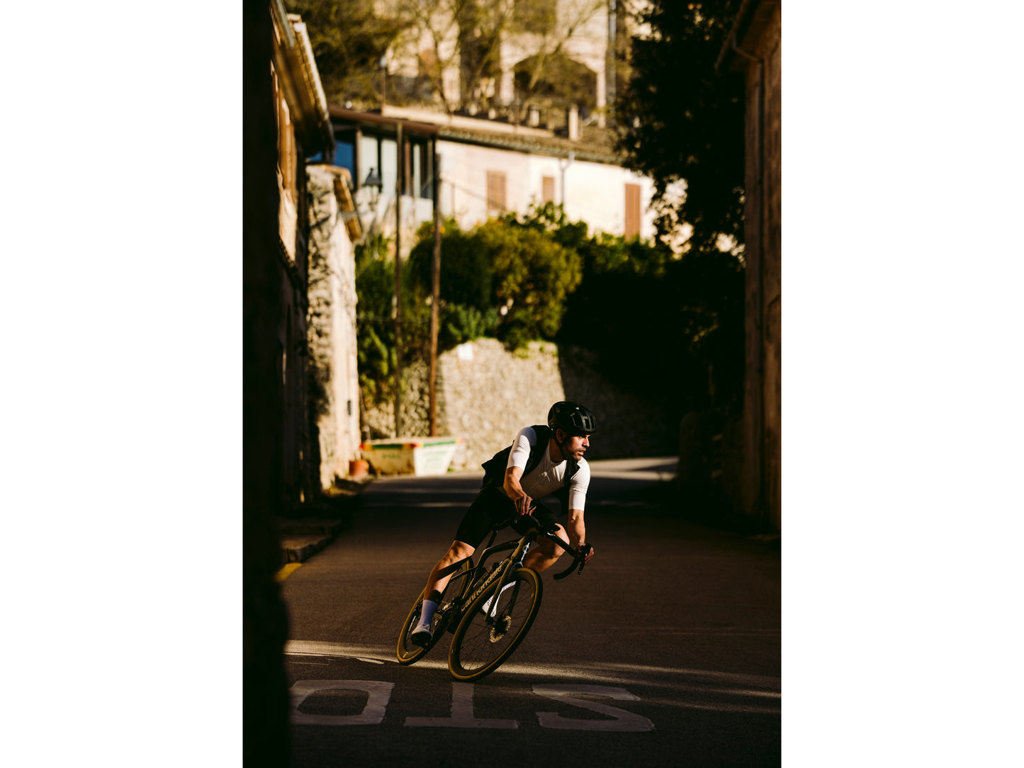 Cannondale Synapse neo Electric bike High Speed Road / commuter Rider on residential city street 