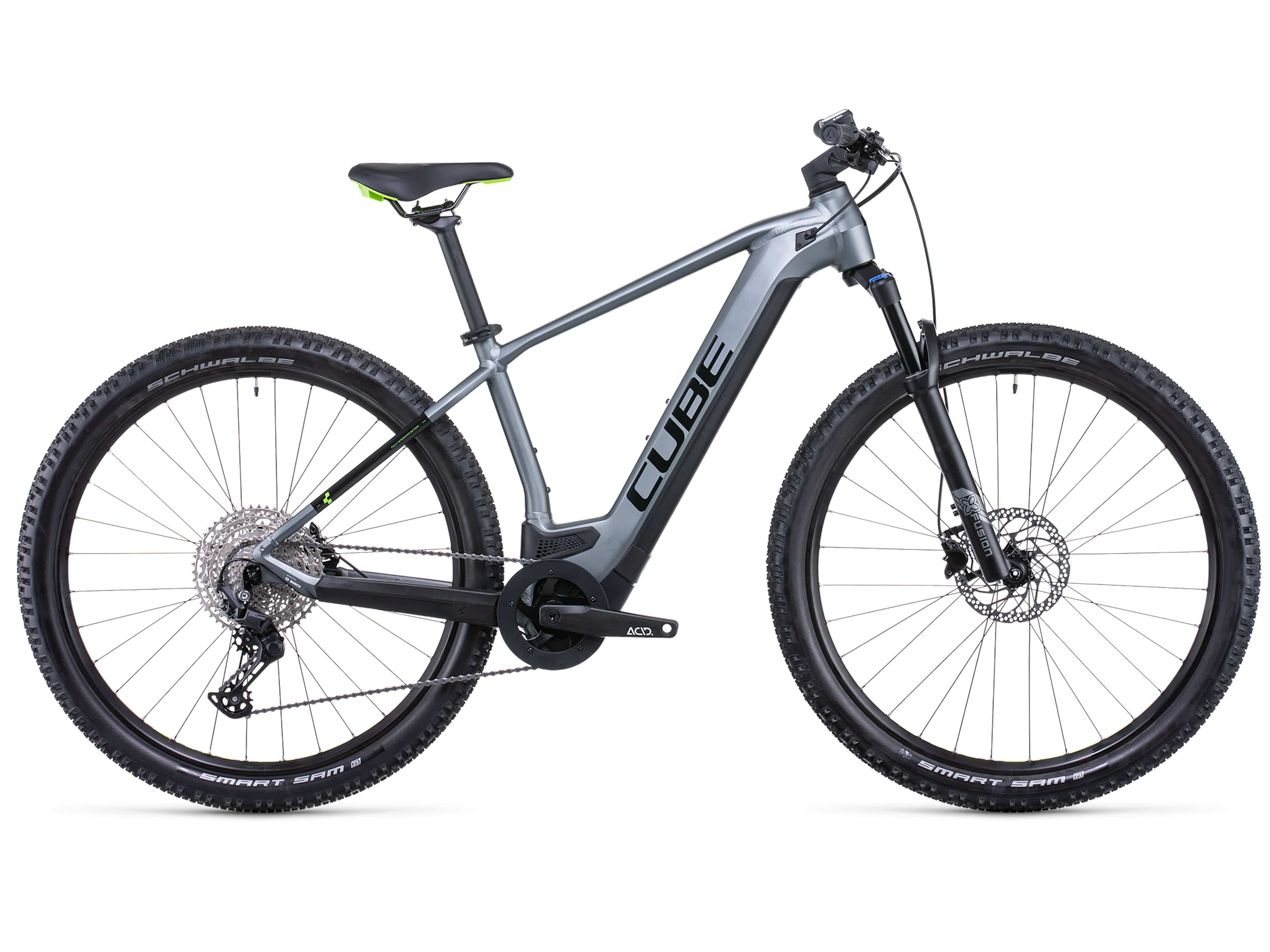 Cube Reaction Hybrid Pro 500 hardtail eMTB in Flashgrey n' green side view on Fly Rides