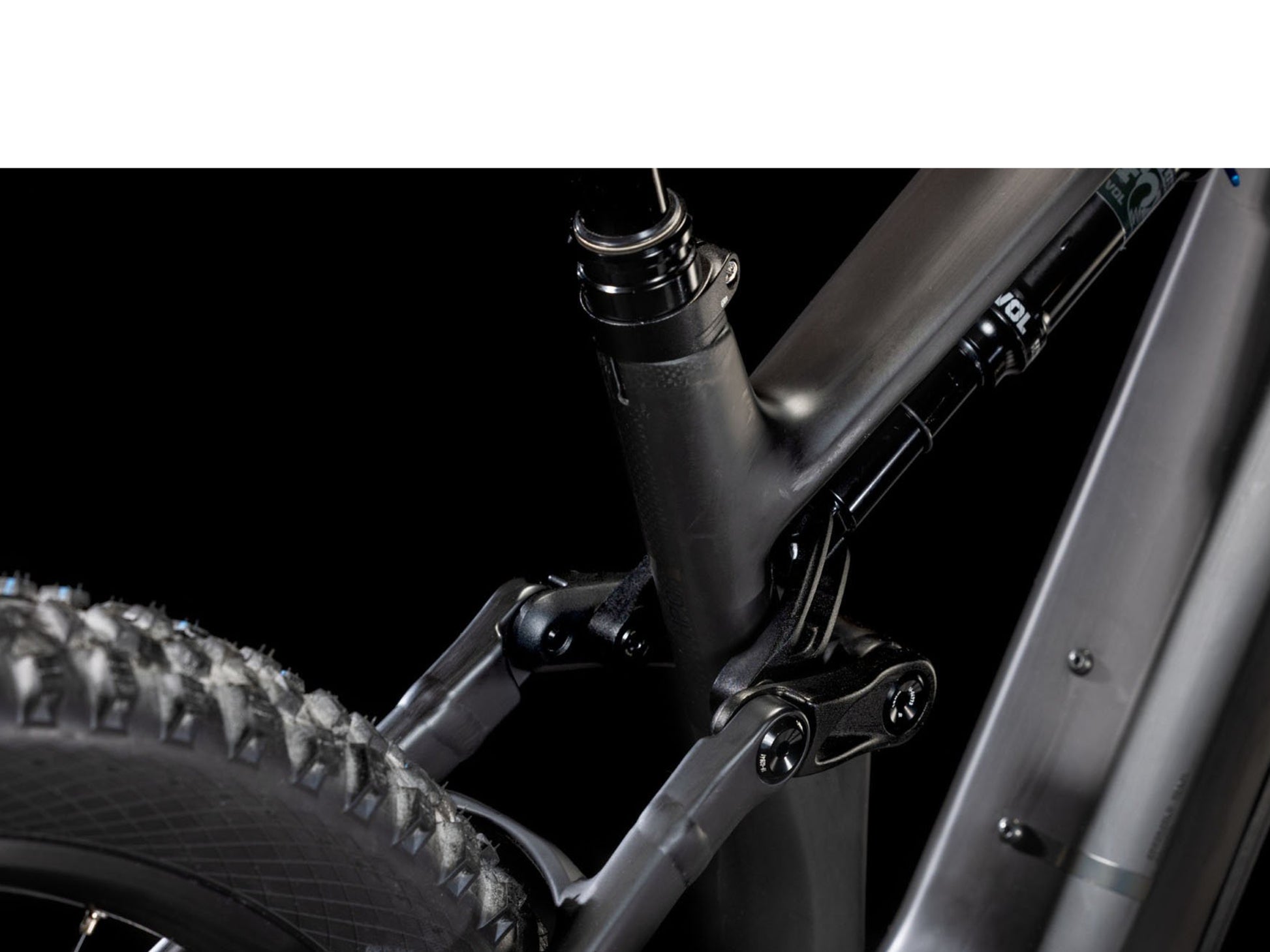 Cube Stereo Hybrid One44 HPC Race Blackline closeup of rear shock and linkage