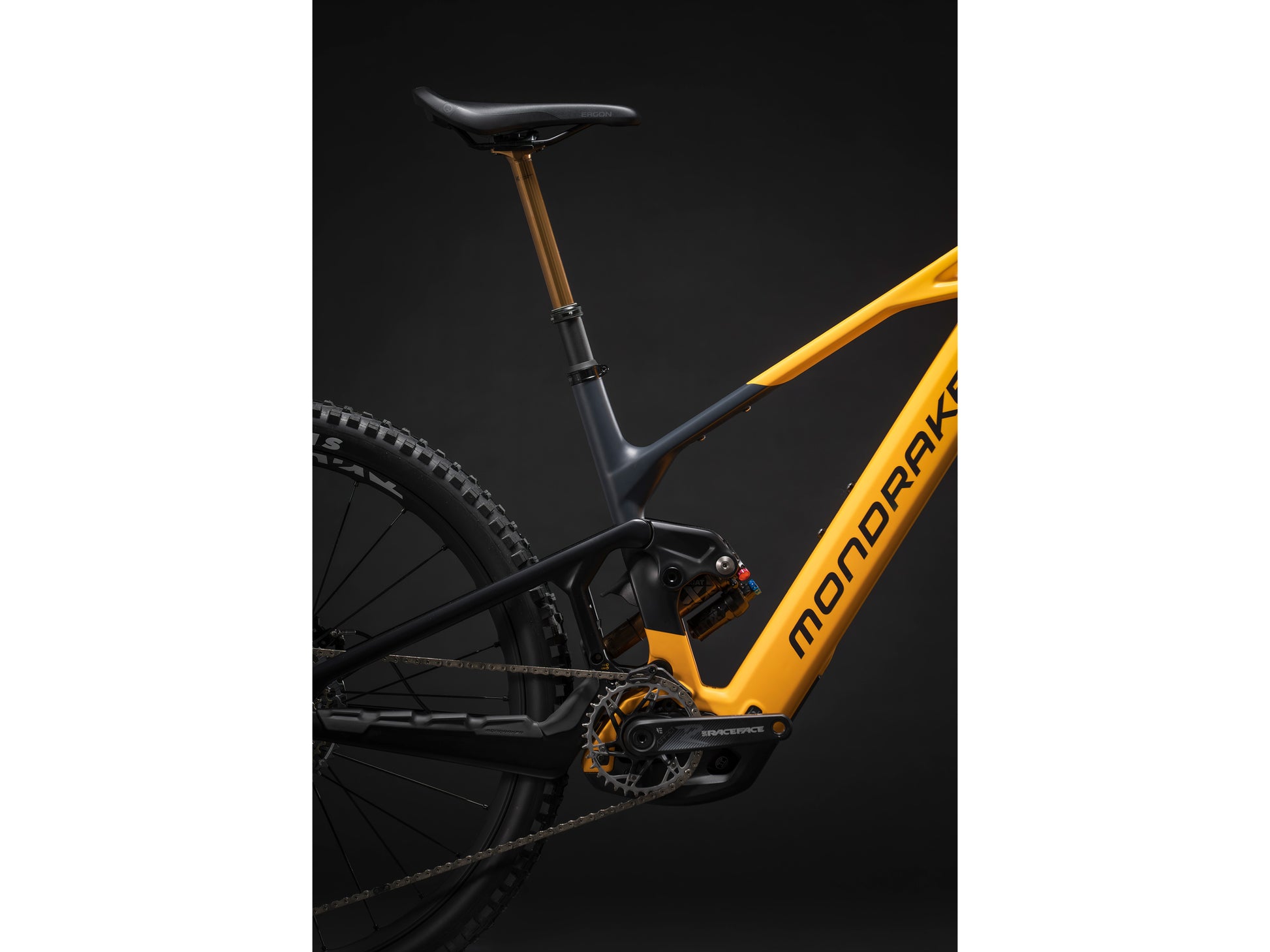 Mondraker Crafty Carbon RR S Full Suspension eMTB Enduro Dense yellow Seatpost, Saddle, rear shock, drivetrain studio shot