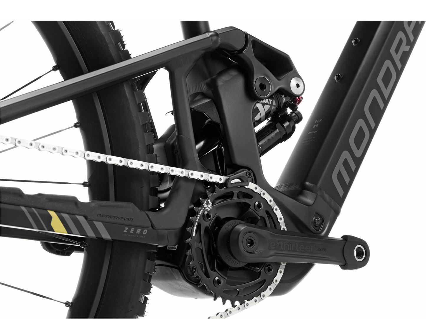 Mondraker Sly RR eMTB Enduro Black / nimbus grey / tonic gold Closeup of Rear shock, crank, chainring, chain