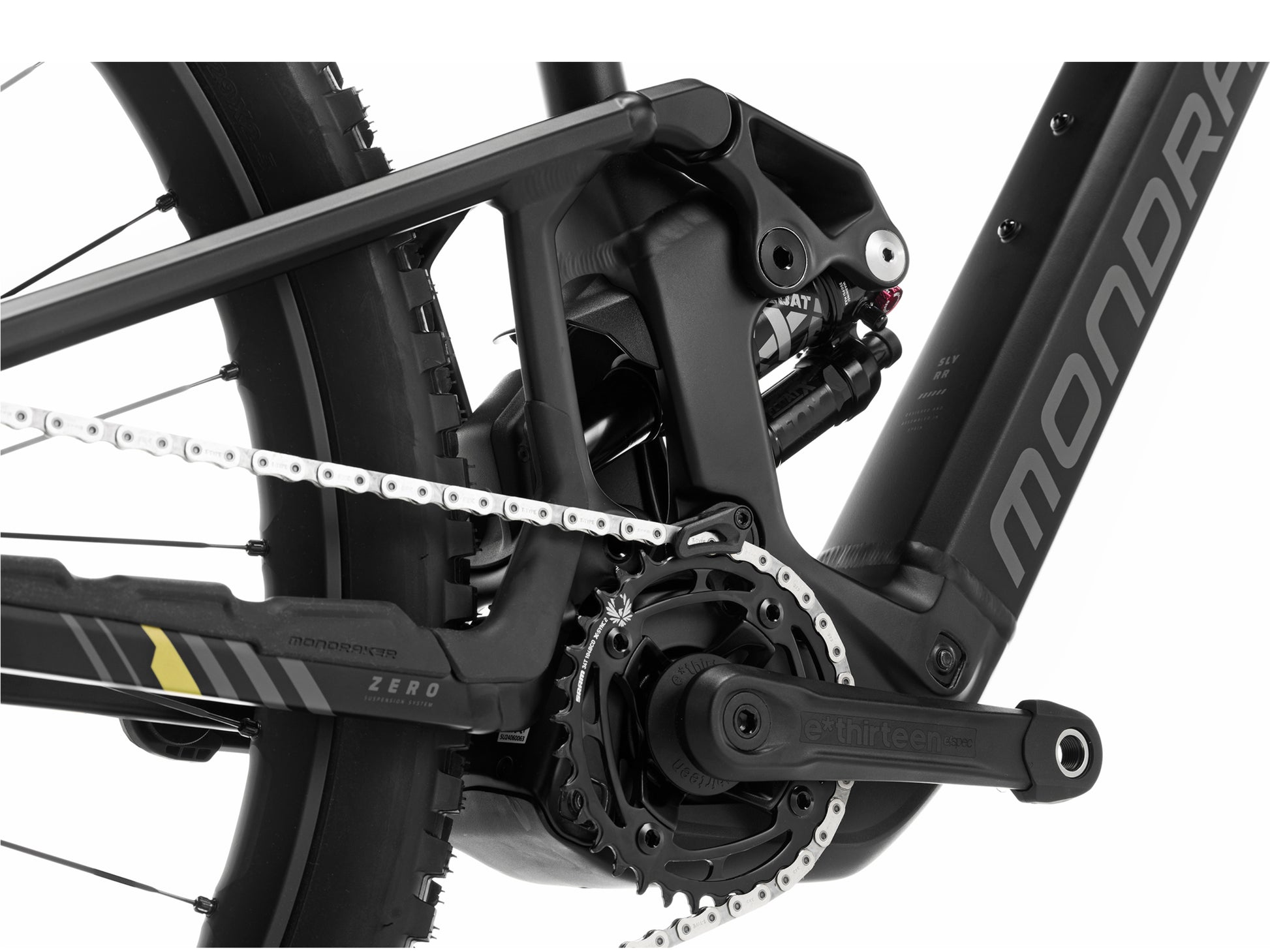 Mondraker Sly RR eMTB Enduro Black / nimbus grey / tonic gold Closeup of Rear shock, crank, chainring, chain