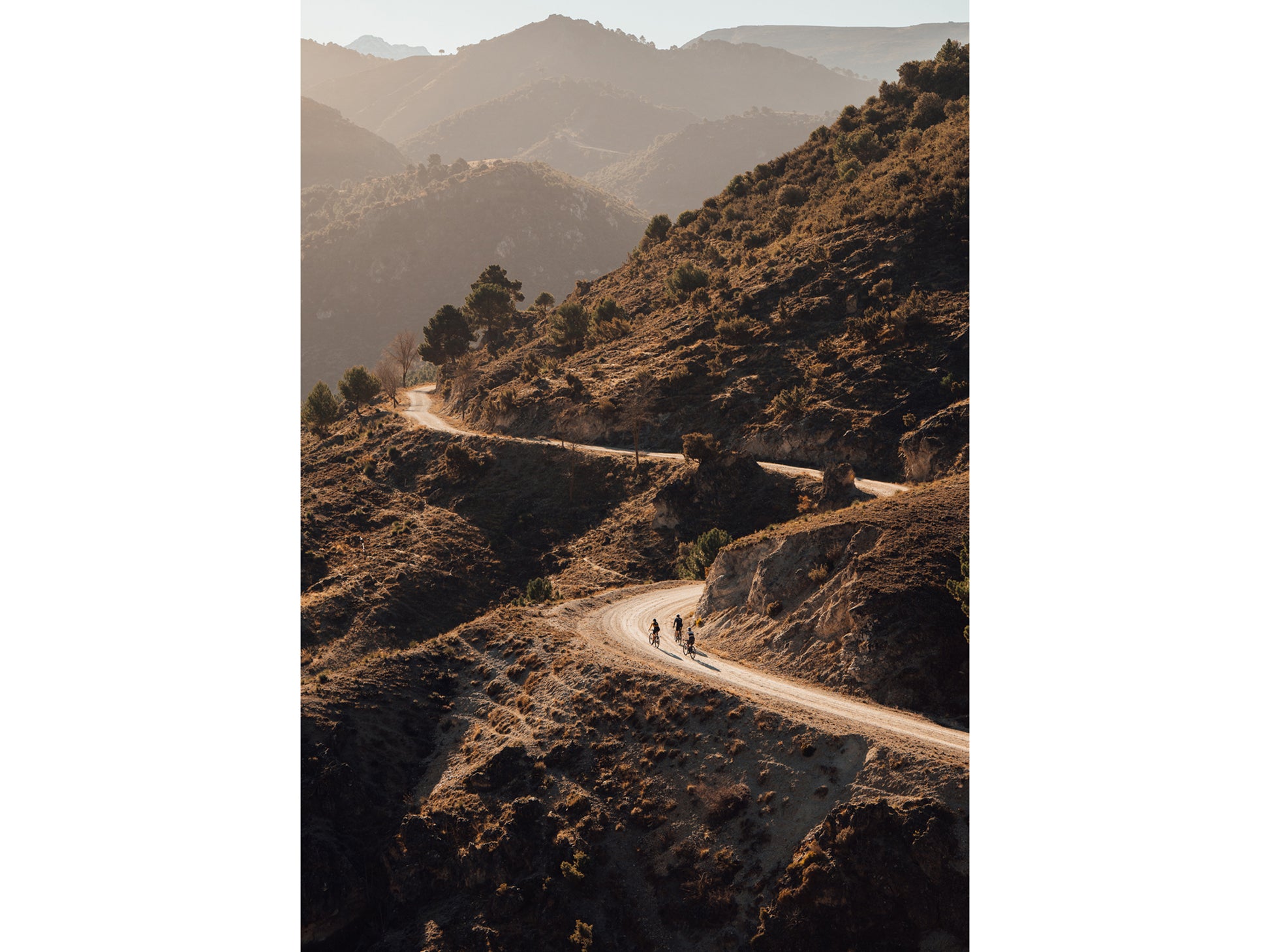 Orbea Denna Gravel Road / commuter eBike. Action | Riders on mountain dirt path. Rolling hills