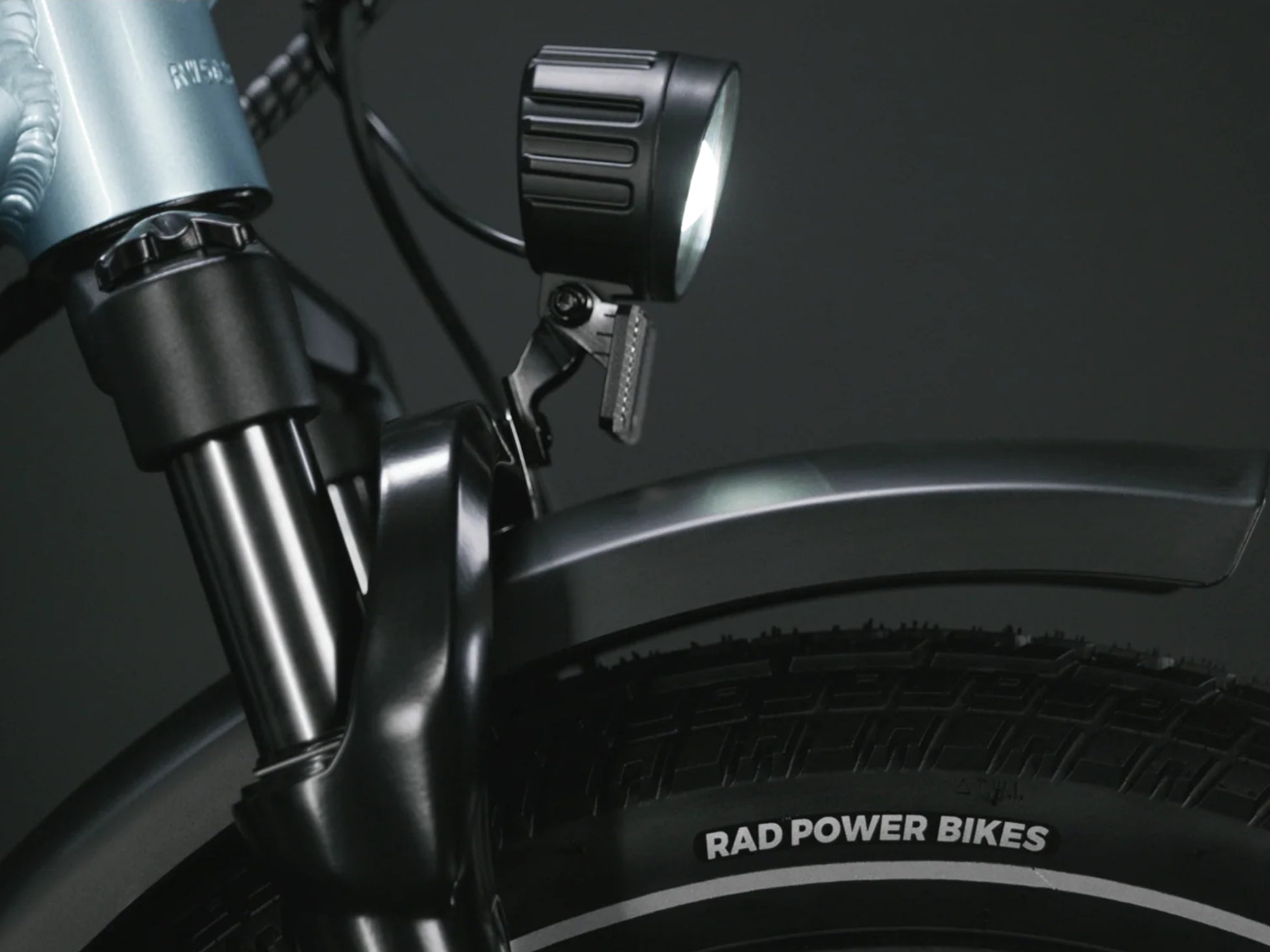 Rad Power RadWagon 5 Electric Cargo bike Metalllic blue Headlight, front fender closeup