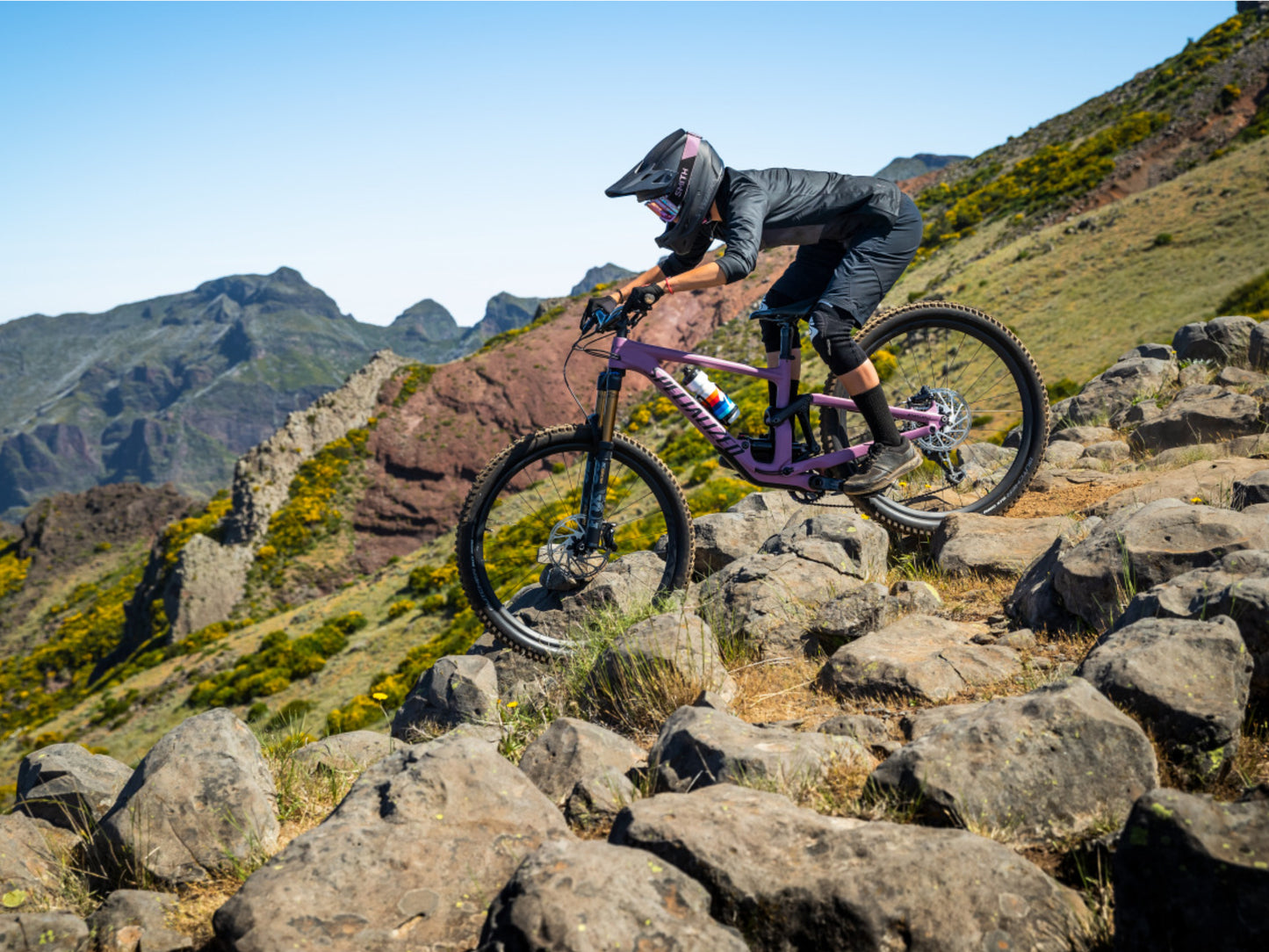 Specialized Enduro Full Suspension Mountain bike Downhill Rider navigating rock pile