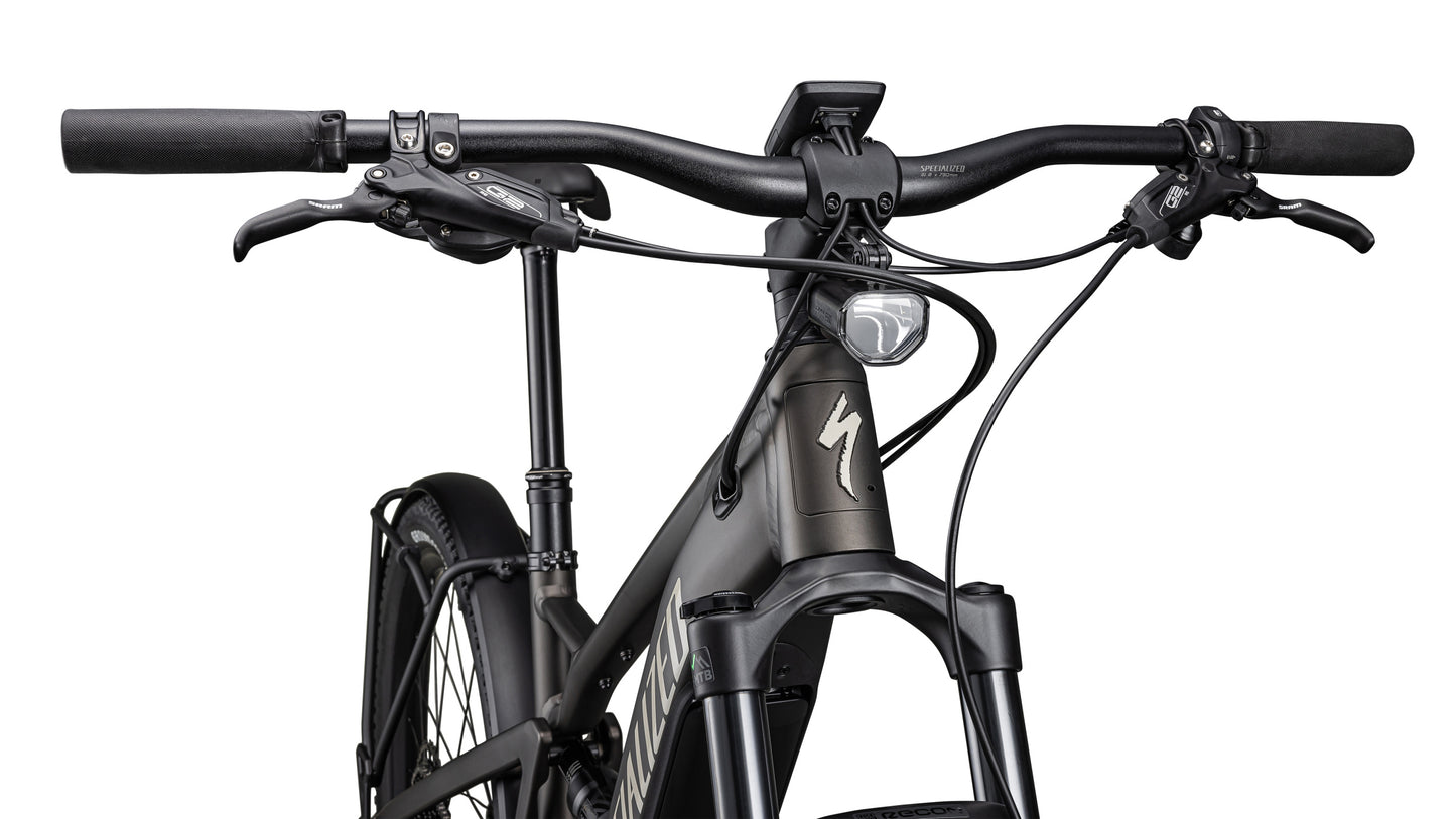 Specialized Tero X 4.0 Gunmetal / white mountains. Handlebars, headlight rearview of bike on Fly Rides USA