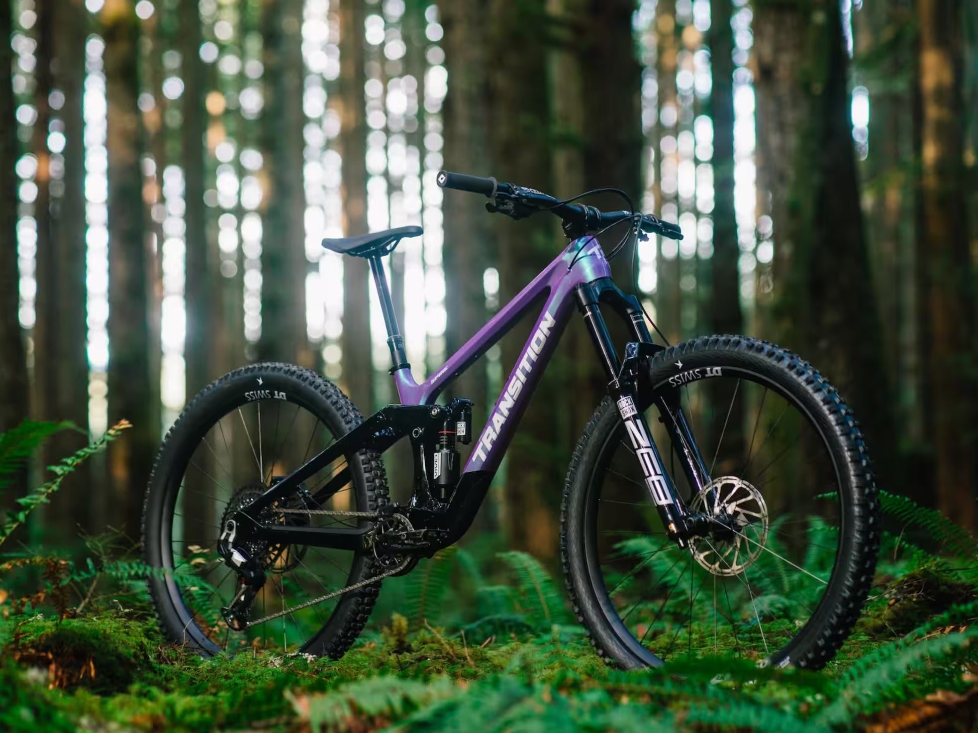 Transition Spire Full suspension Mountain bike in forest setting