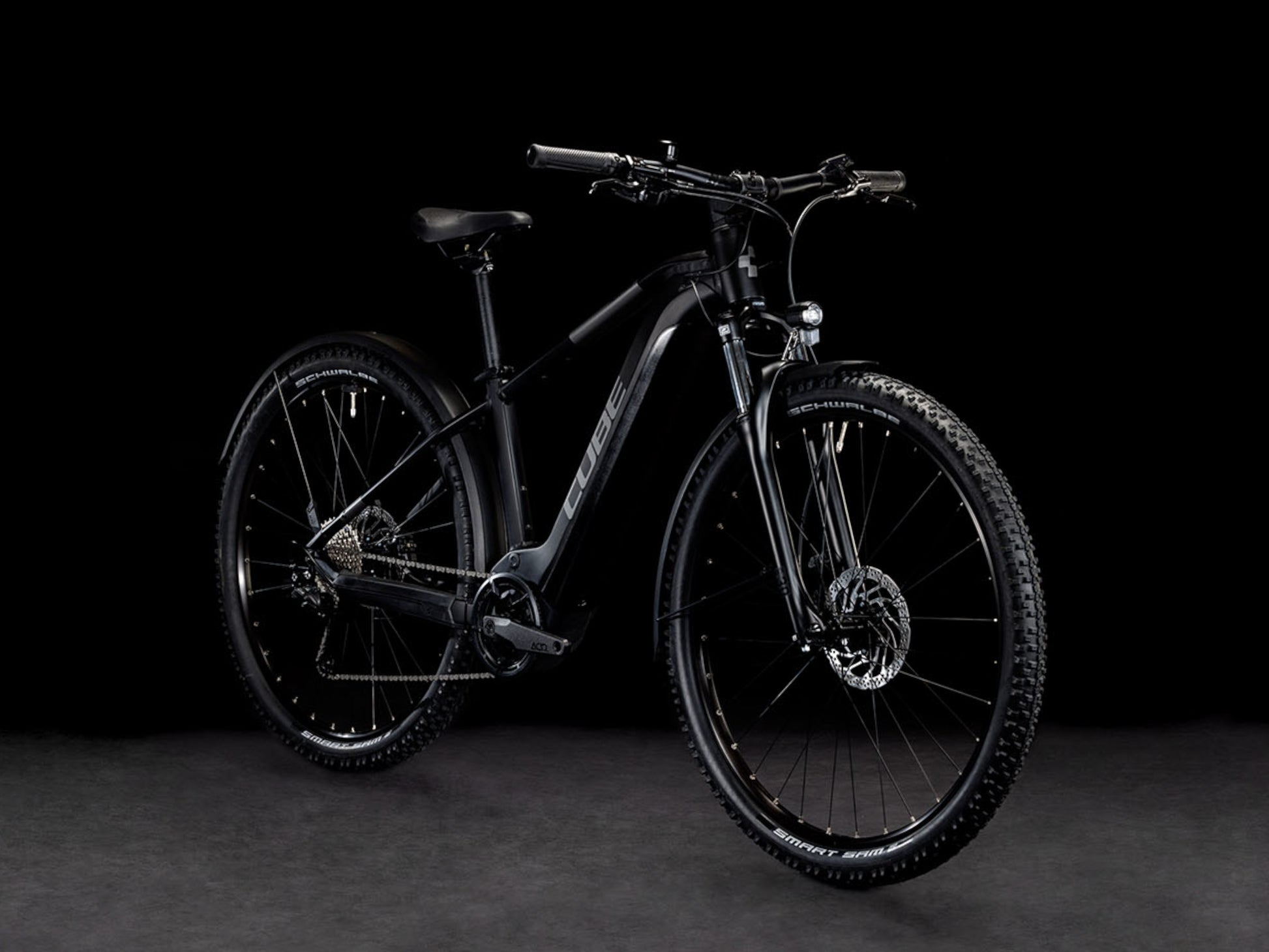 https://flyridesusa.com/cdn/shop/products/Cube_Reaction_Hybrid_Performance_500_Allroad_eMTB_hardtail_black_n_grey_back_right_side_profile_on_Fly_Rides.jpg?v=1673545413&width=1946
