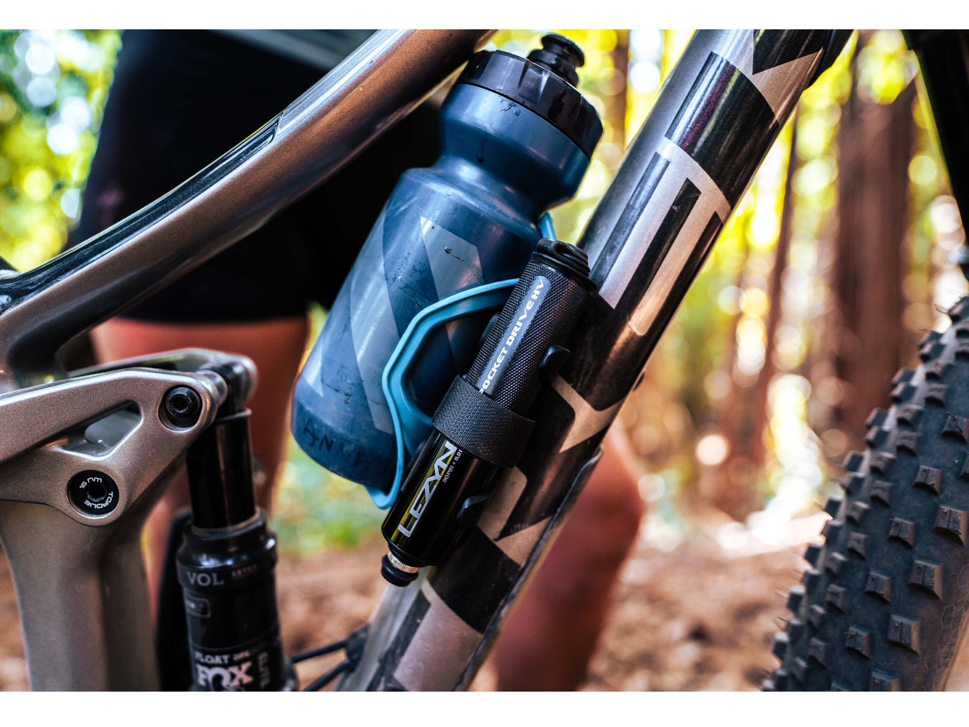 Lezyne Hand Pump pocket drive HV closeup installed on bike frame water bottle cage