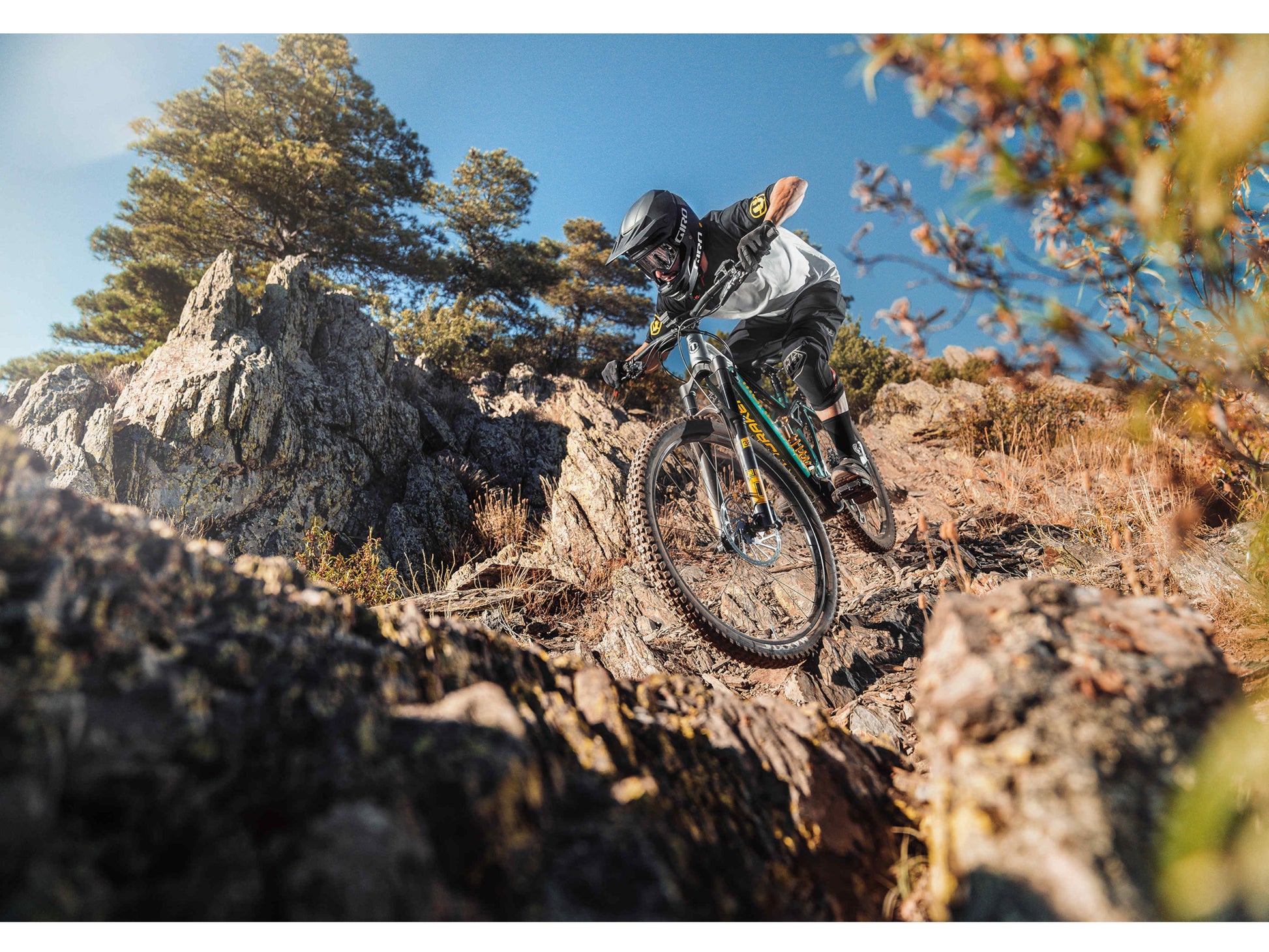 Mondraker Level XR eMTB full suspension  man riding down technical single track